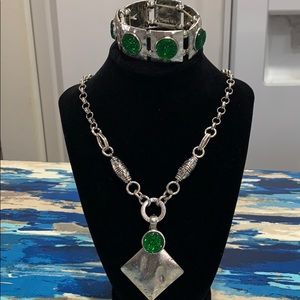 Silver toned necklace and bracelet w/green garnet